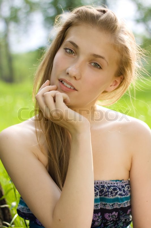 1487040-portrait-of-beautiful-teen-girl-with-hand-near-the-face-in-the-park.jpg