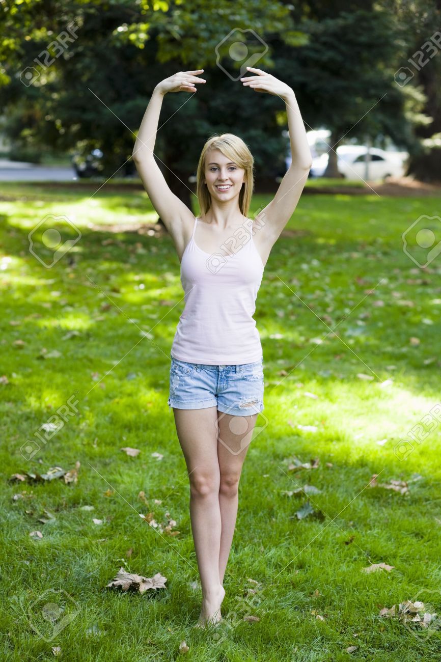 5745145-Pretty-Teen-Girl-in-Park-Doing-a-Ballet-Pose-Stock-Photo.jpg