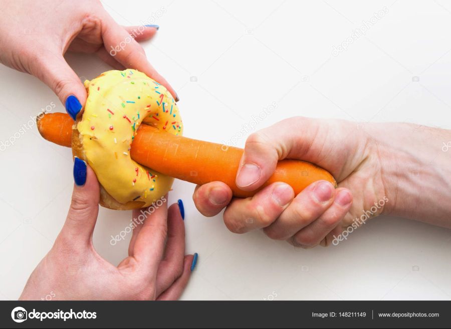depositphotos_148211149-stock-photo-hands-with-carrot-inside-donut.jpg
