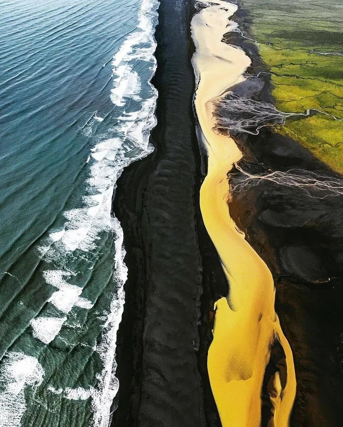 Where-green-field-yellow-river-black-beach-and-blue-sea-meets-Iceland.jpg