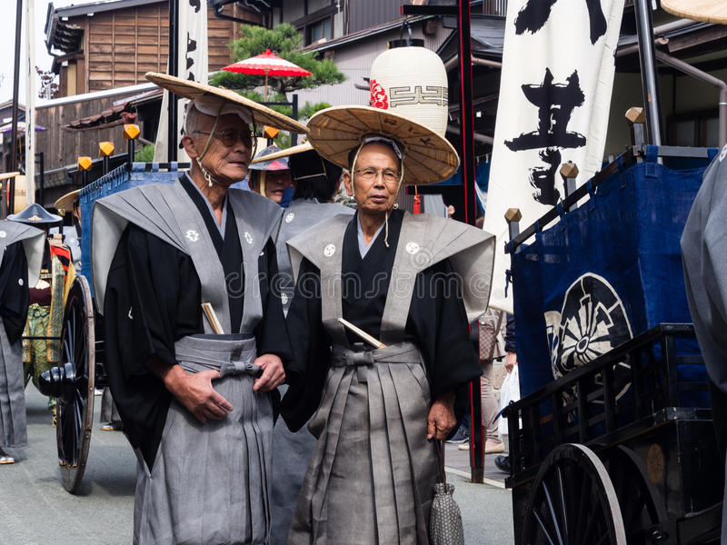 two-elderly-japanese-men-traditional-samurai-costumes-takayama-japan-october-local-people-dressed-as-marching-streets-89342819.jpg